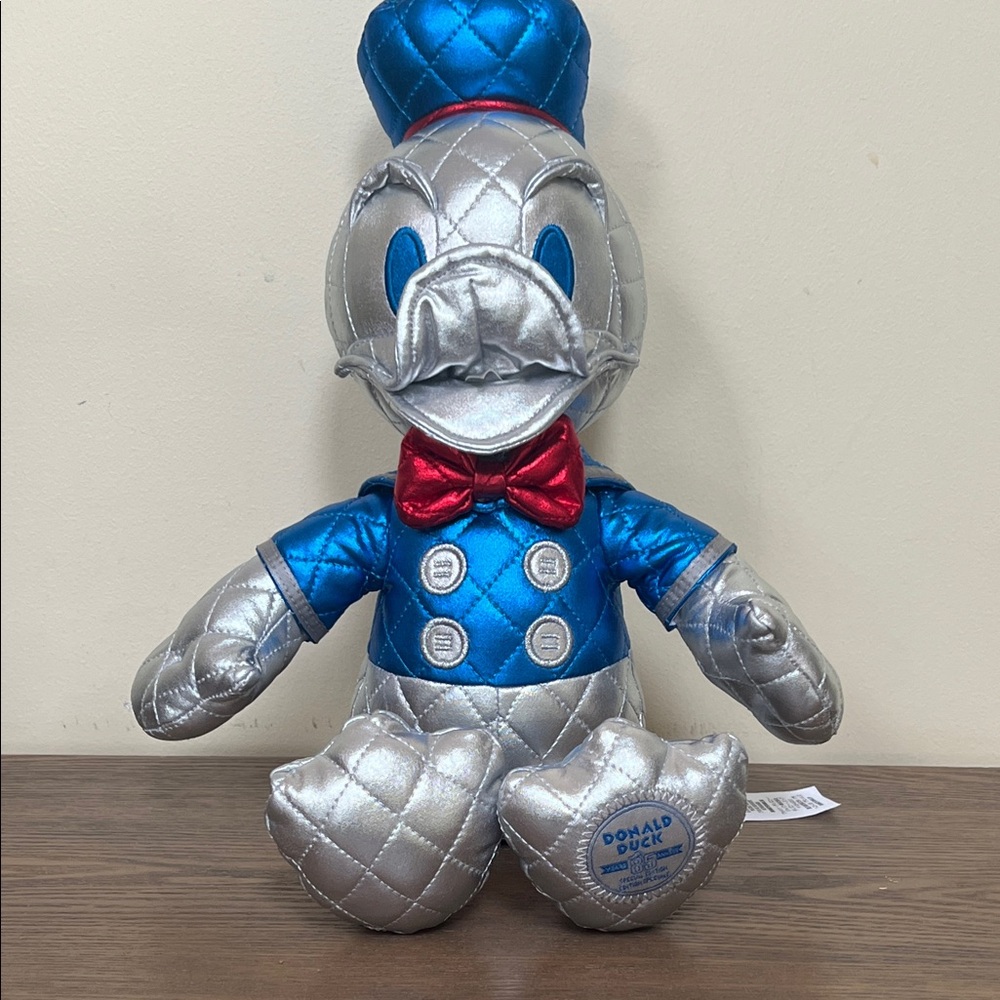 Disney Donald Duck 85th Anniversary Silver and Blue Plush with Red Accent